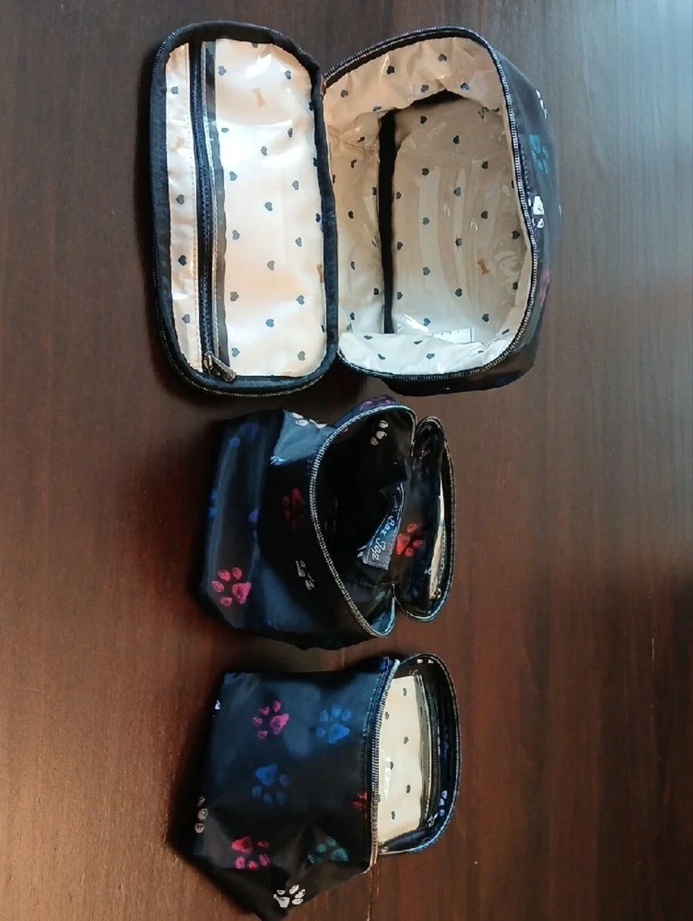 lug Black Cosmetic Case with Multicolor Paw Prints
